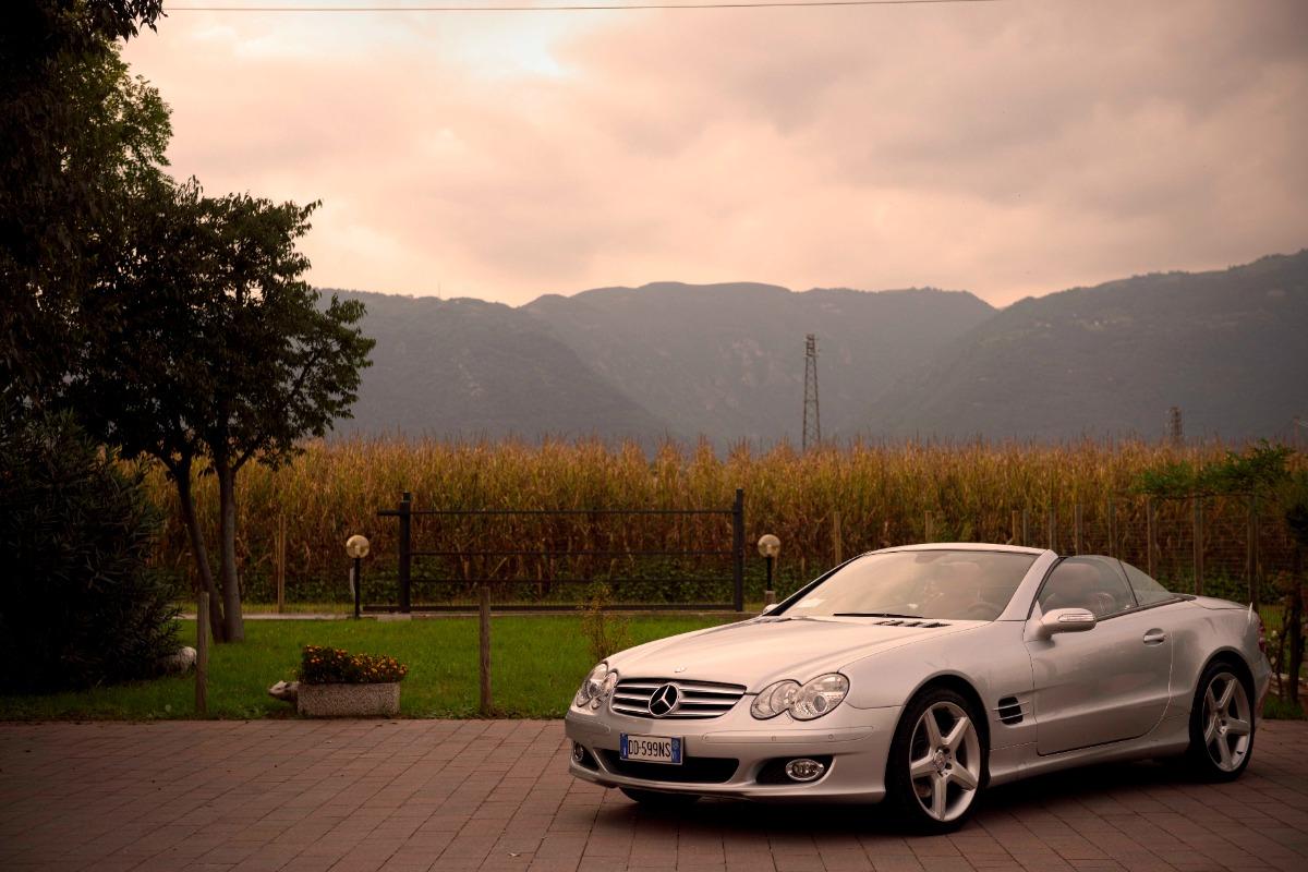 Giardino comune con magnifica vista sulle montagne e parcheggio gratuito