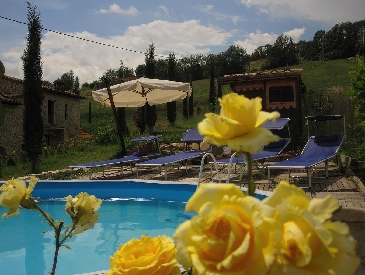 Vista piscina e zona relax