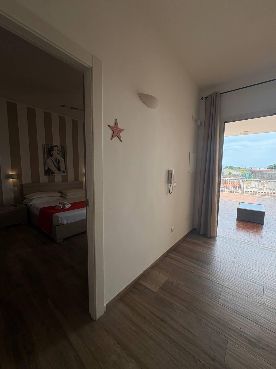 Camera tripla con ampio terrazzo di pertinenza