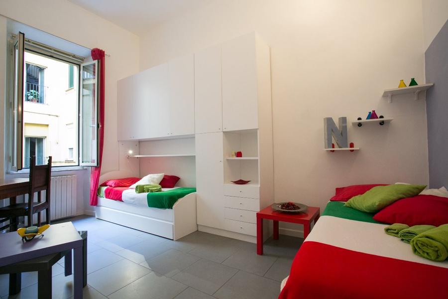 stanza con 2/3 letti trilocale