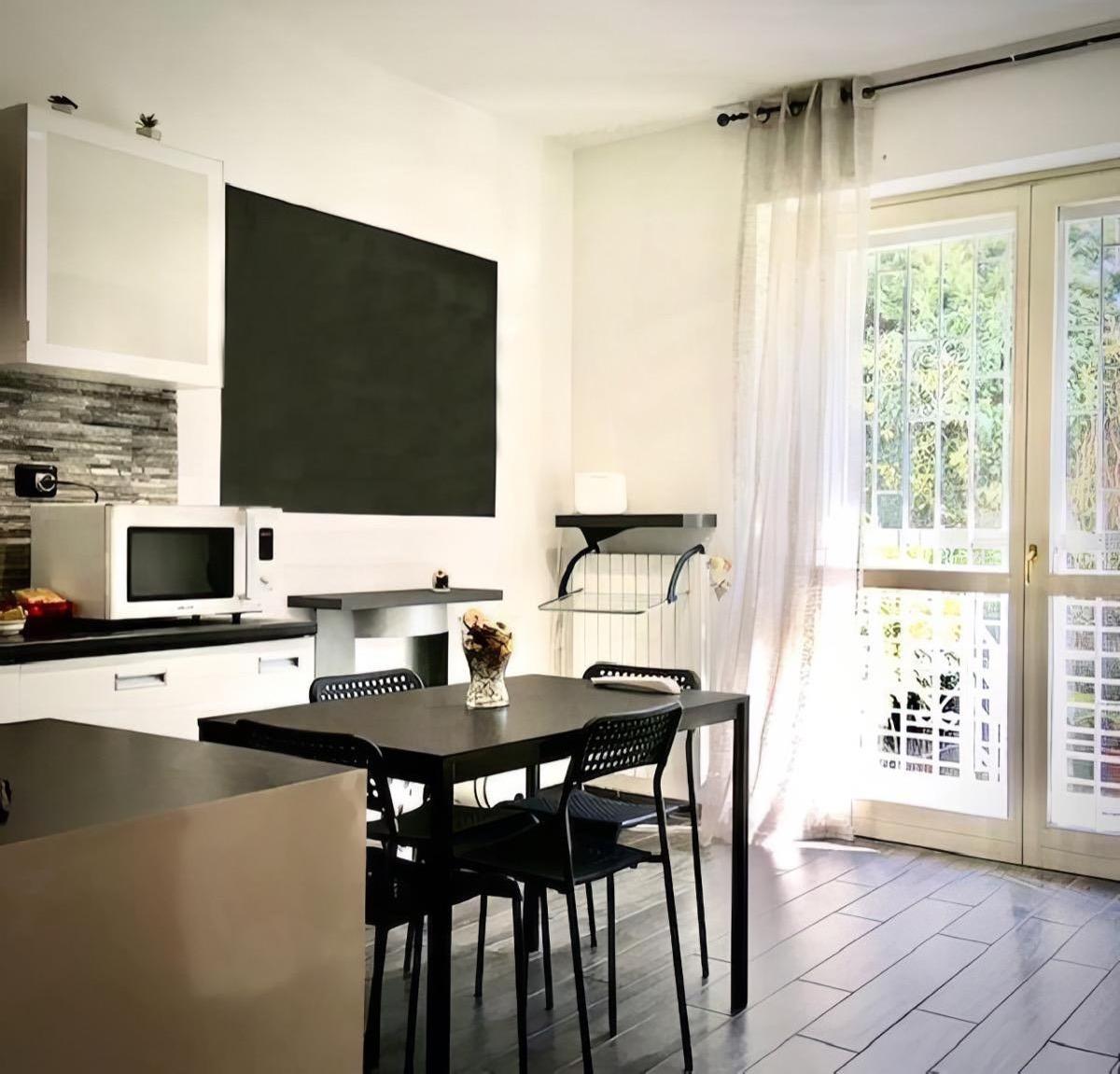 Appartamento con giardino Cucina attrezzata