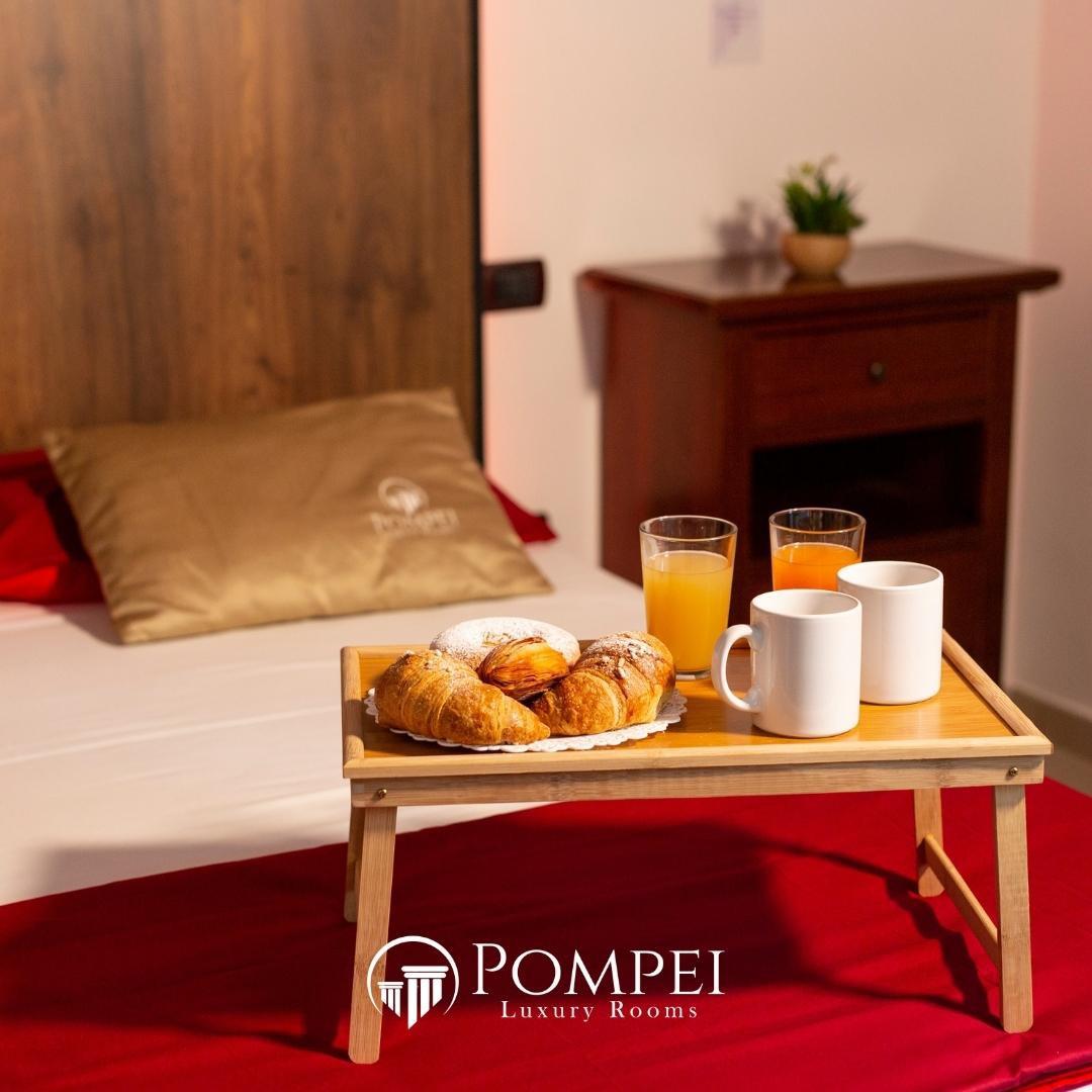 La colazione di POMPEI LUXURY ROOMS