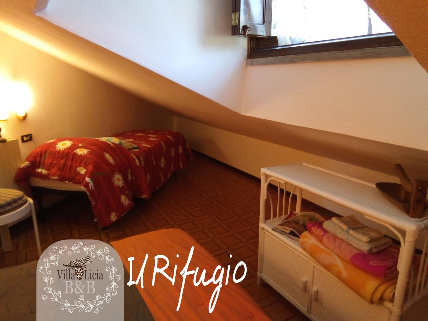 La camera Rifugio con spazio aggiuntivo per famiglie e piccoli gruppi.