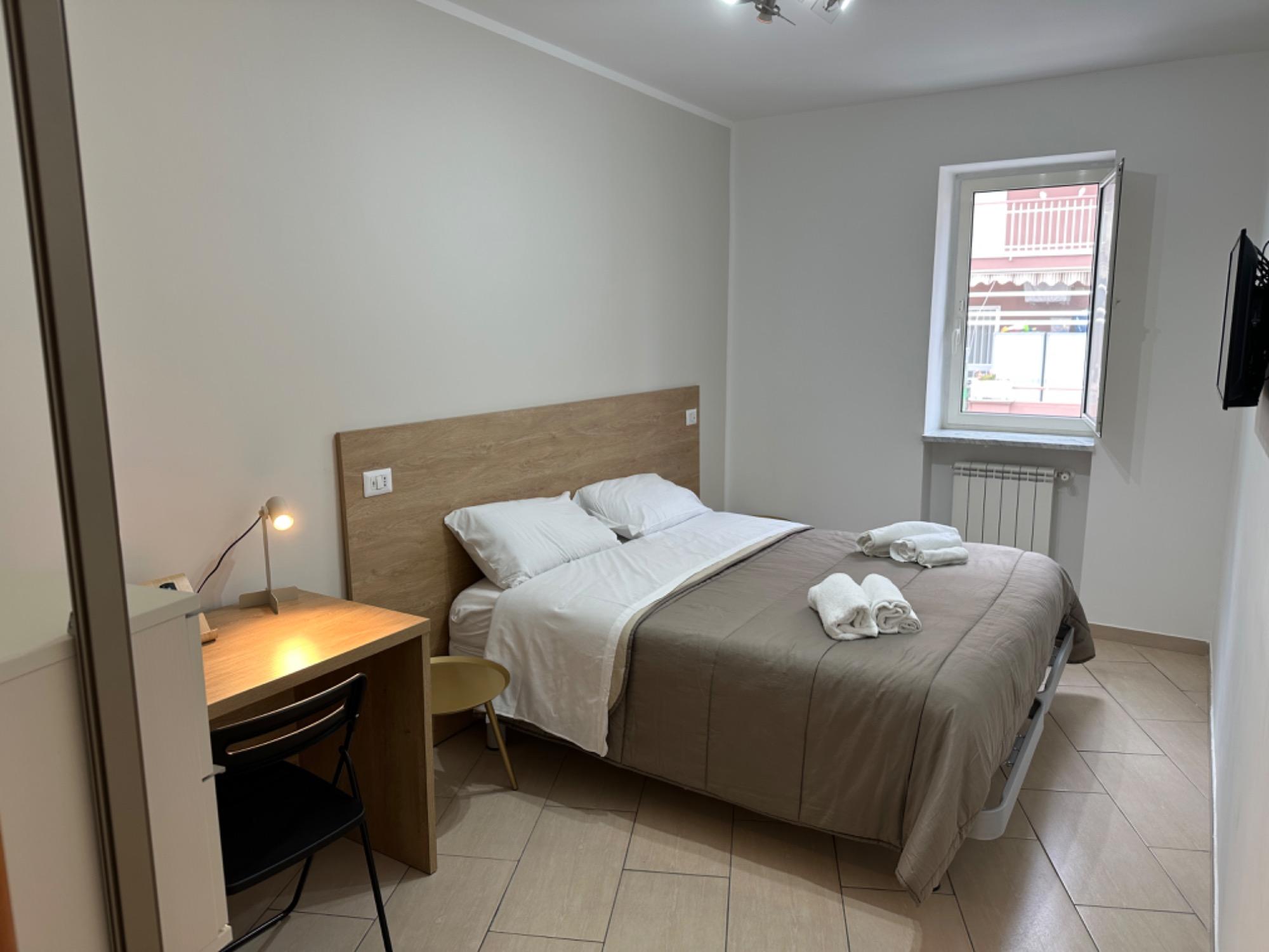 Camera da Letto con Finestra