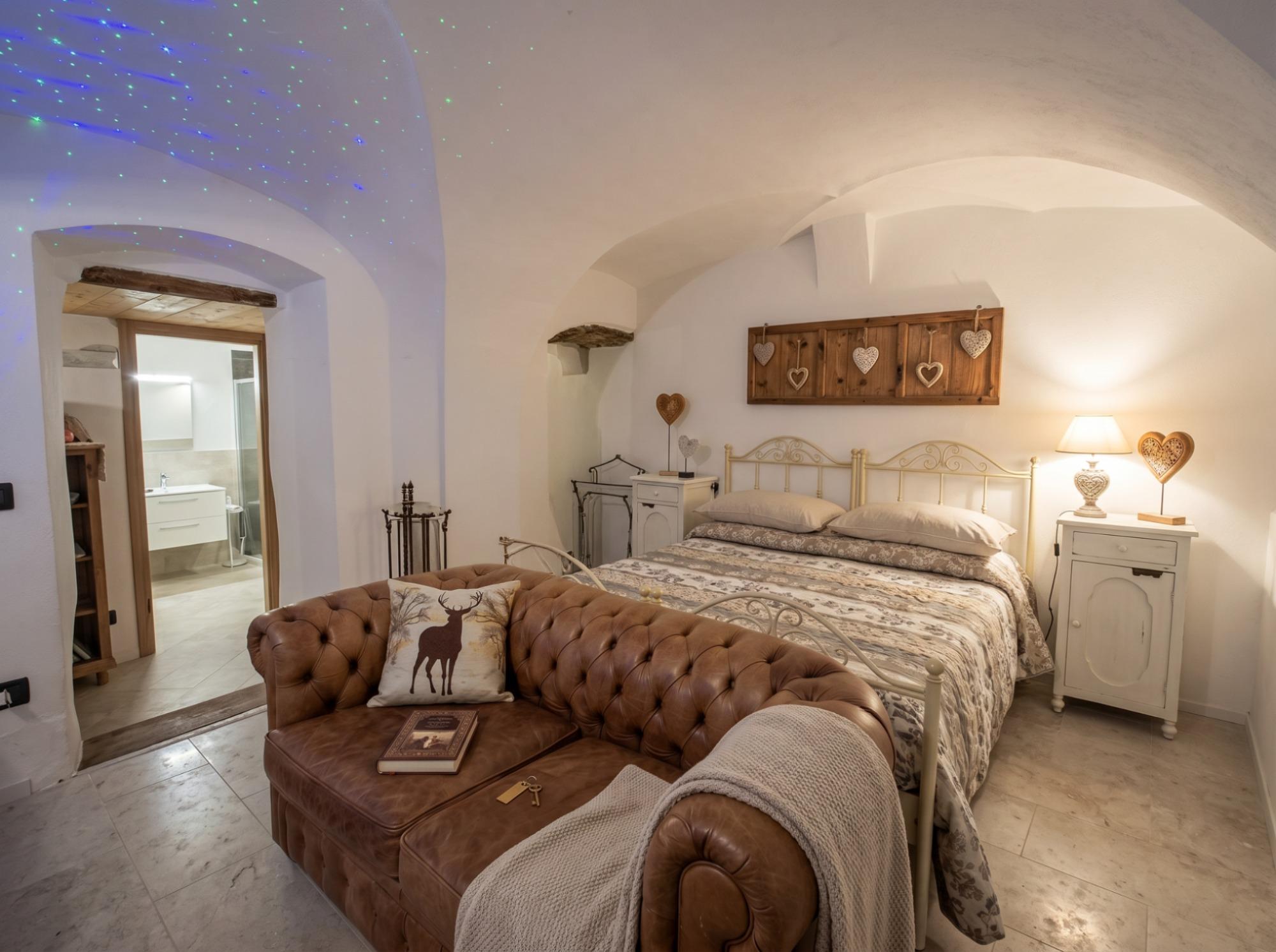 Suite delle Scuderie letto matrimoniale con divano