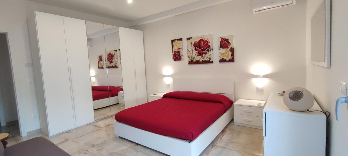 Camera da letto con divano letto