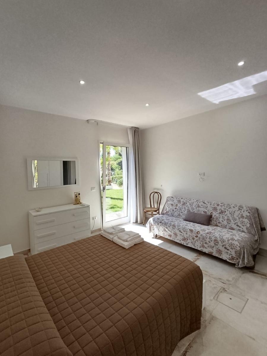 Camera da letto con divano letto