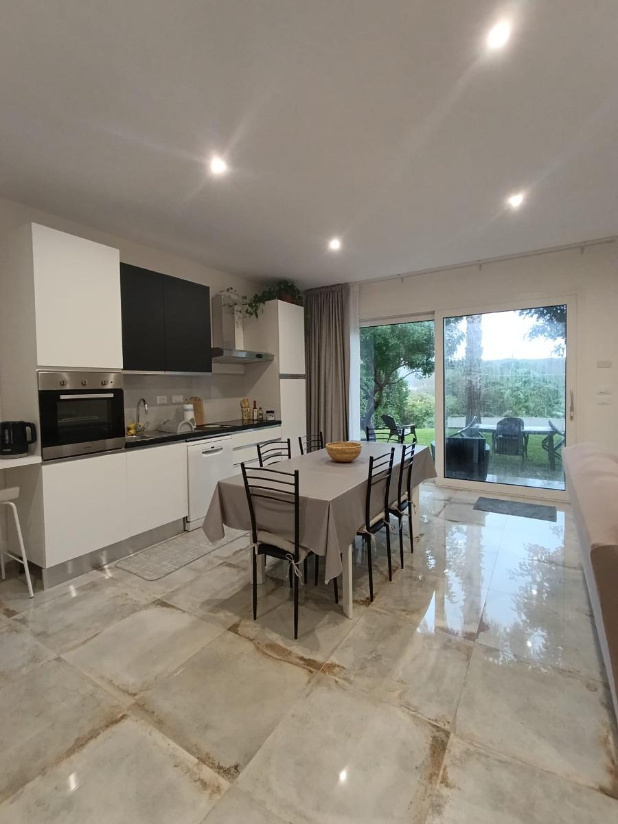 Zona giorno con angolo cottura