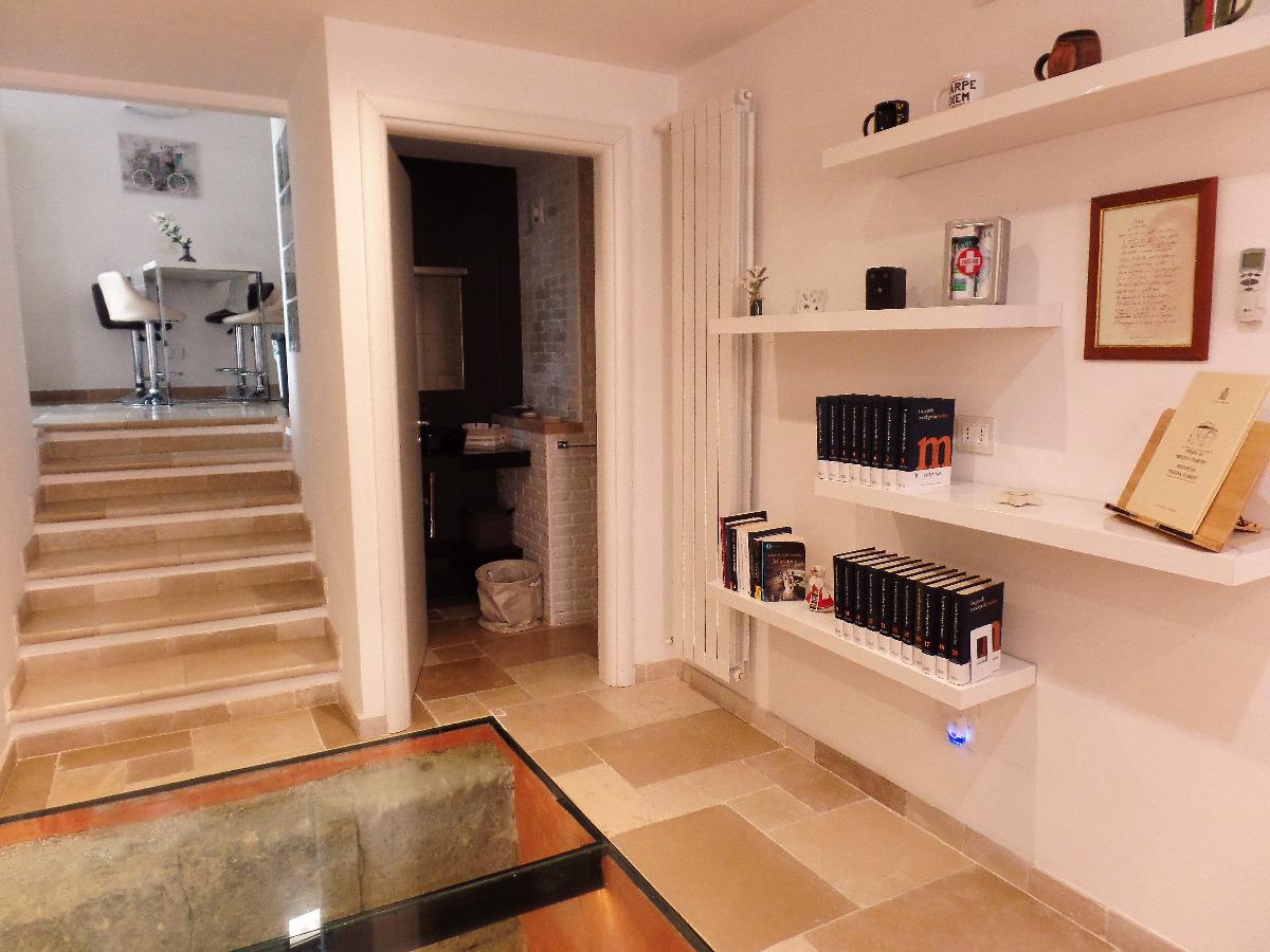 ZONA LIBRERIA SOGGIORNO