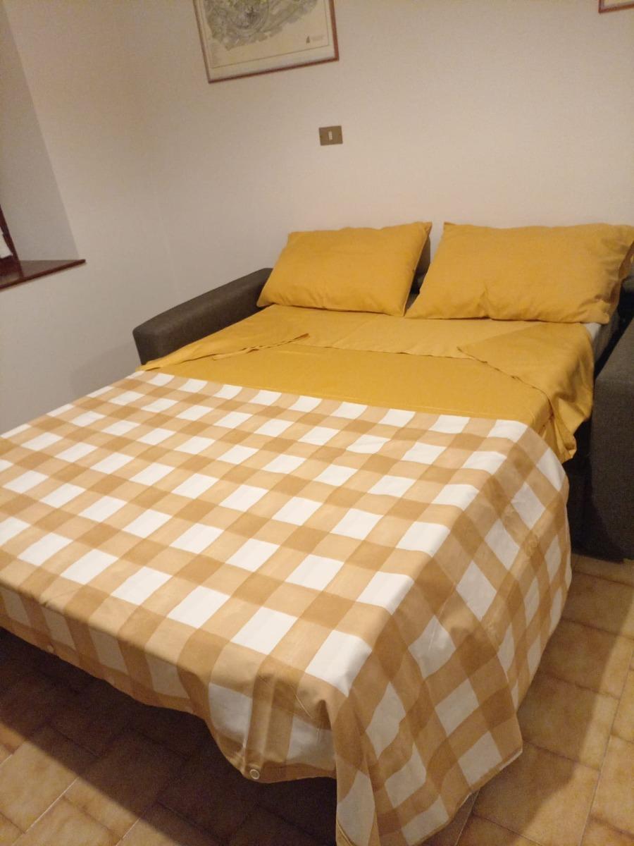 Divano letto in open space