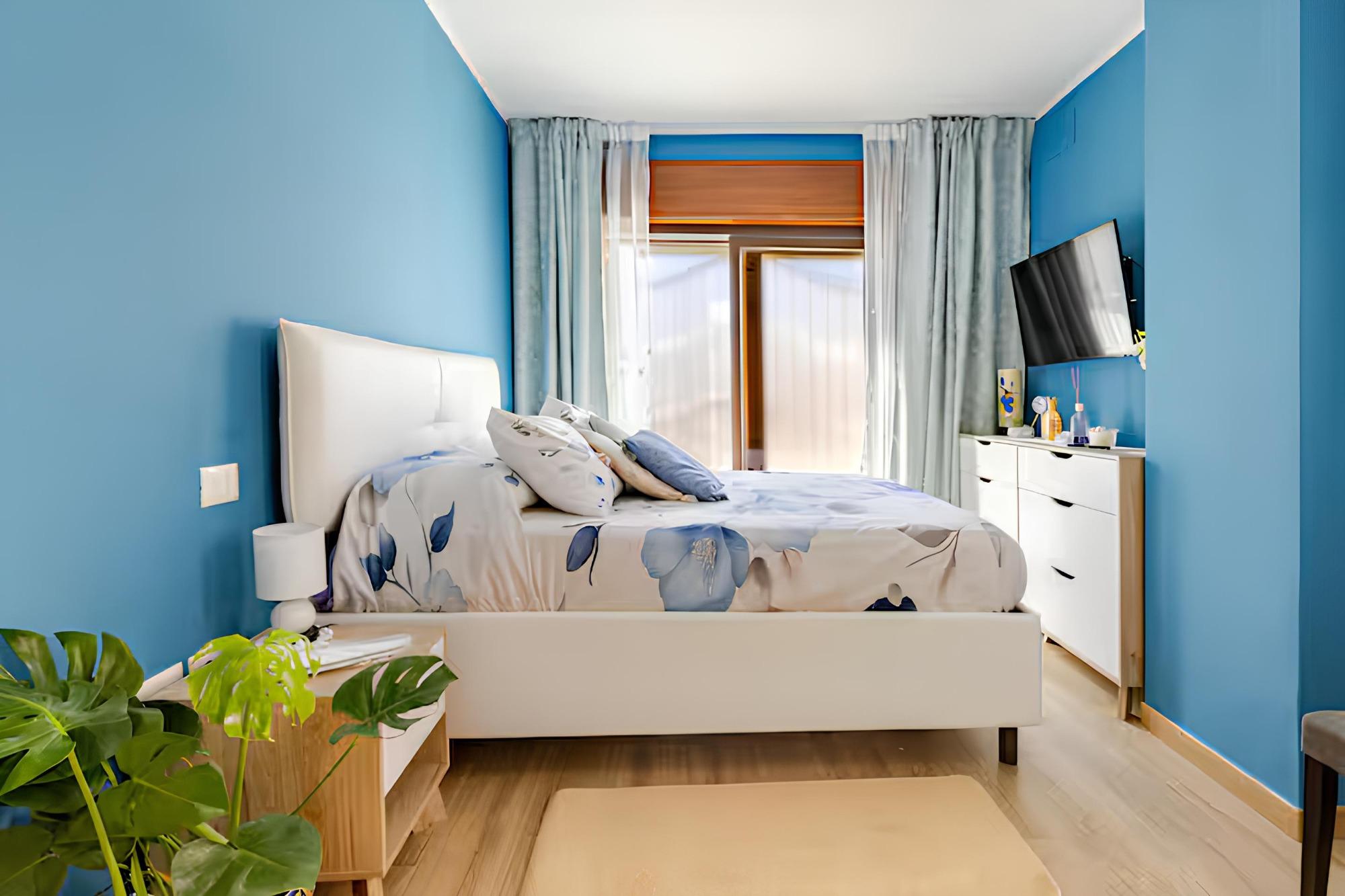 Camera da letto matrimoniale con bagno privato al piano terra (Appartamento Pied-à-terre Casa Caterina)