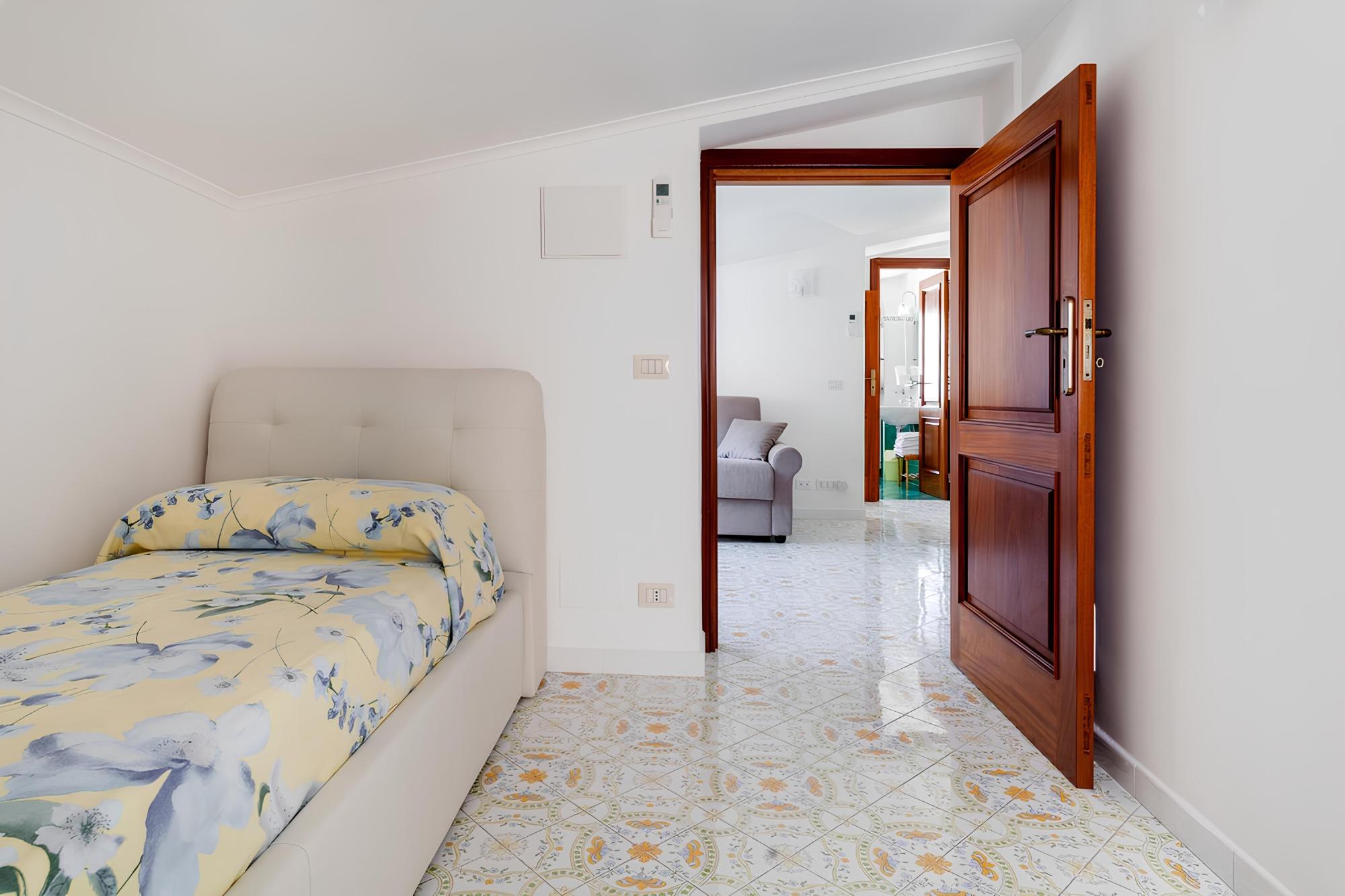 Camera da letto singola al secondo piano mansardato (Appartamento Casa Caterina)