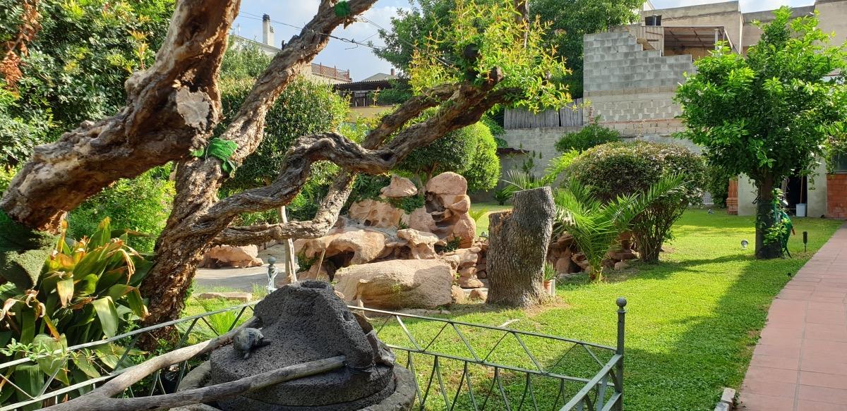 Garden - Lawn and ancient millstone