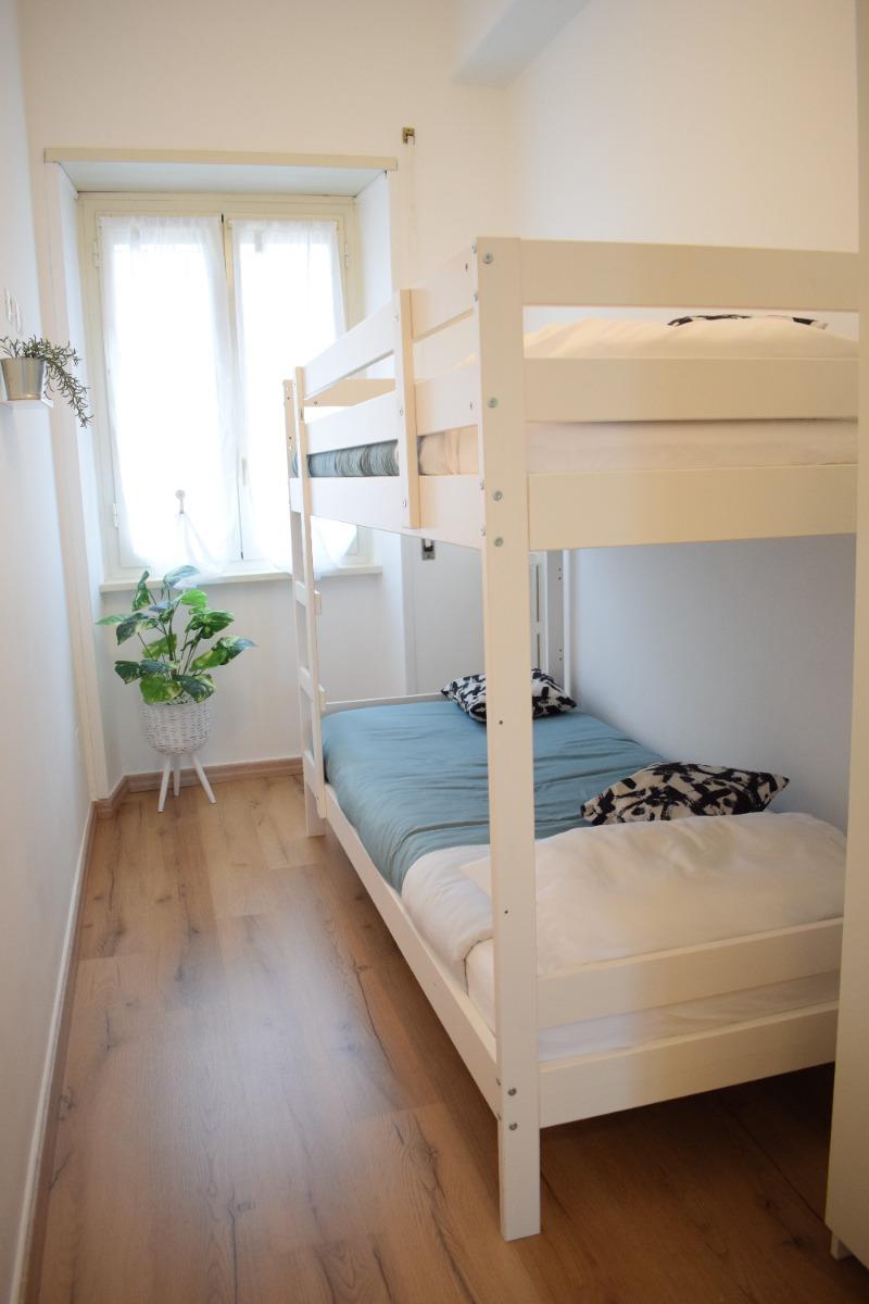 cameretta con letto a castello con armadio, Riscaldamento centralizzato