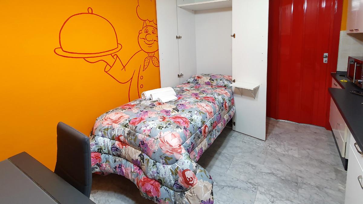 Letto singolo nell'area pranzo