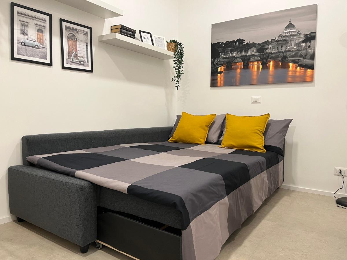 Letto aggiunto divano letto in soggiorno