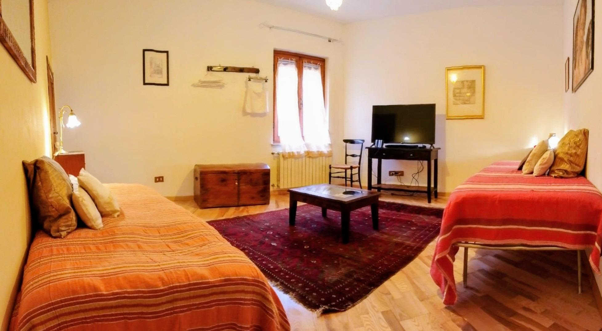 Salotto con 2 letti singoli
