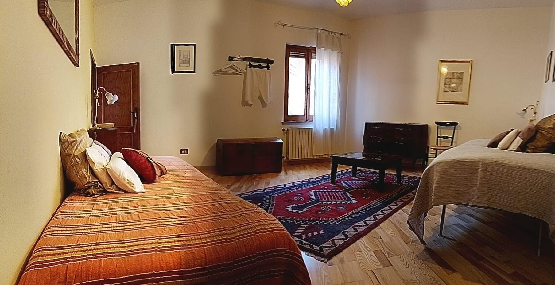 Salotto con 2 letti singoli