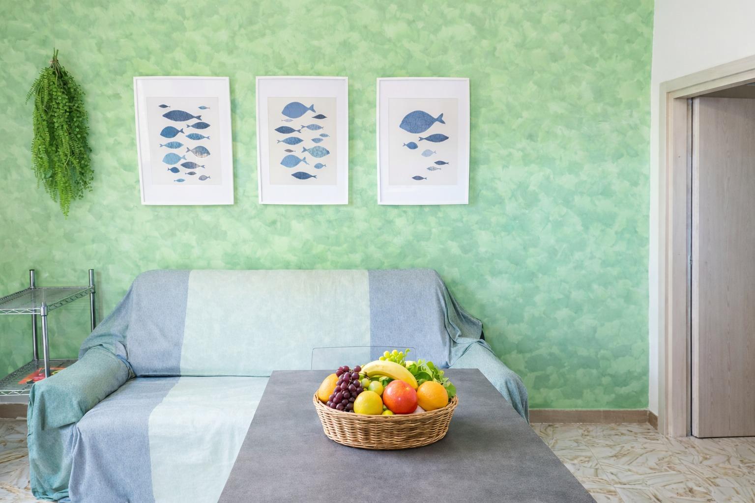 Soggiorno con Angolo Cottura e smart TV