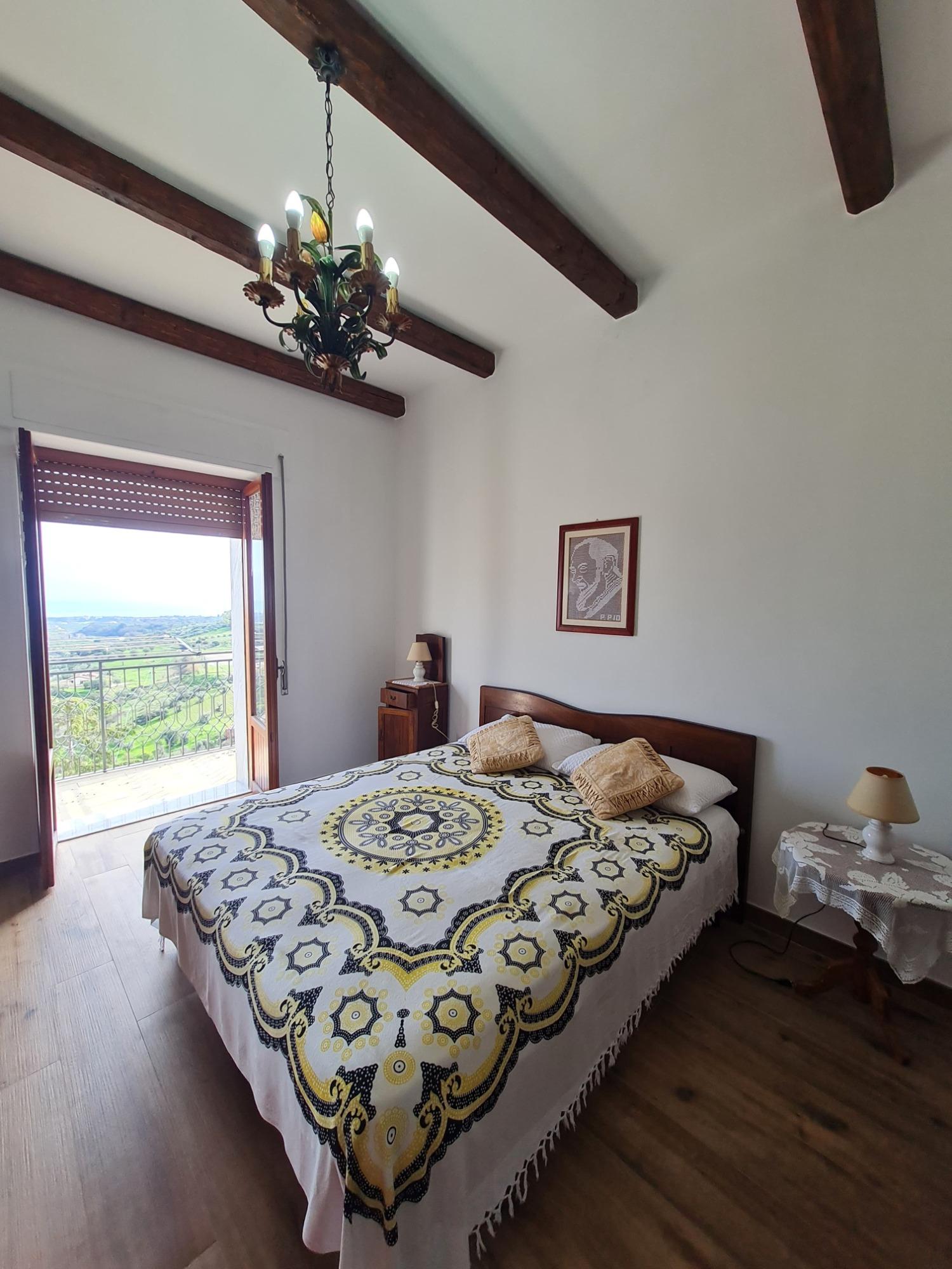 Camera da letto vista mare