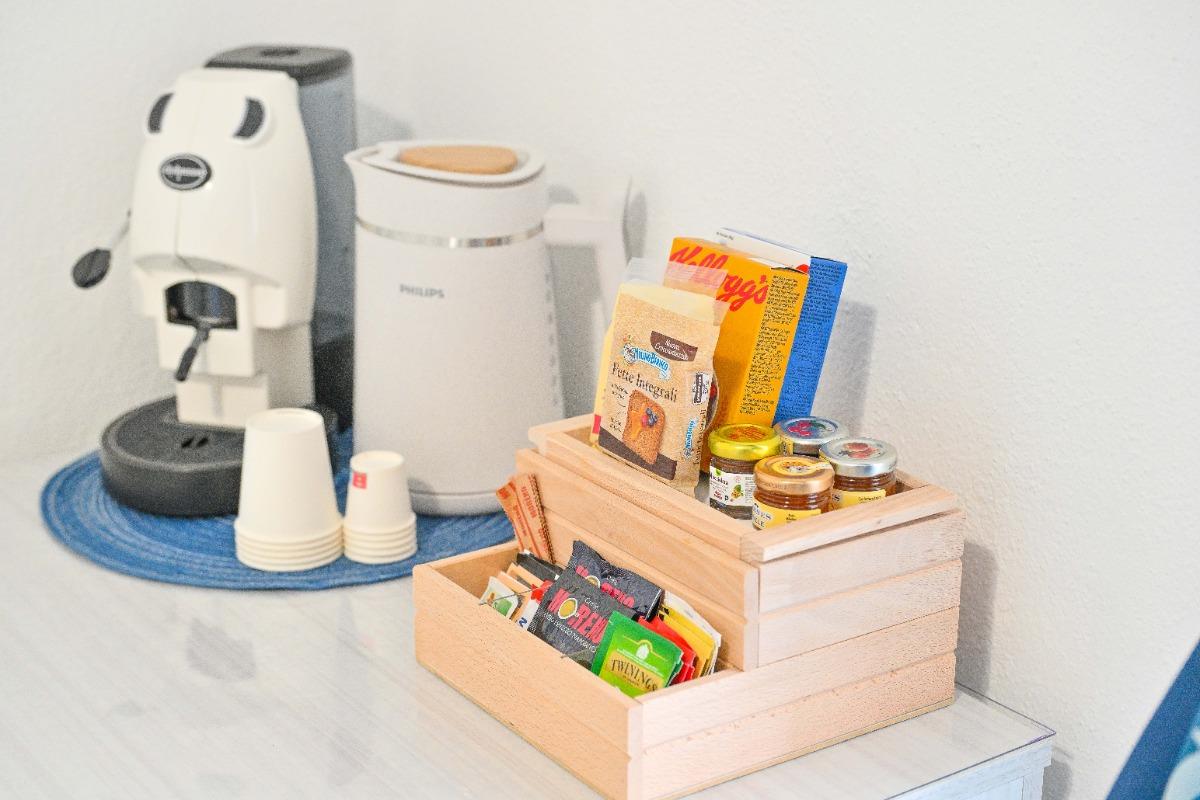 La colazione di CHIAIA DI ROSE ROOMS & APARTMENT