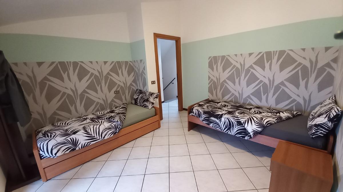camera da letto con due letti singoli 13 mq che all'occorrenza si possono unire
