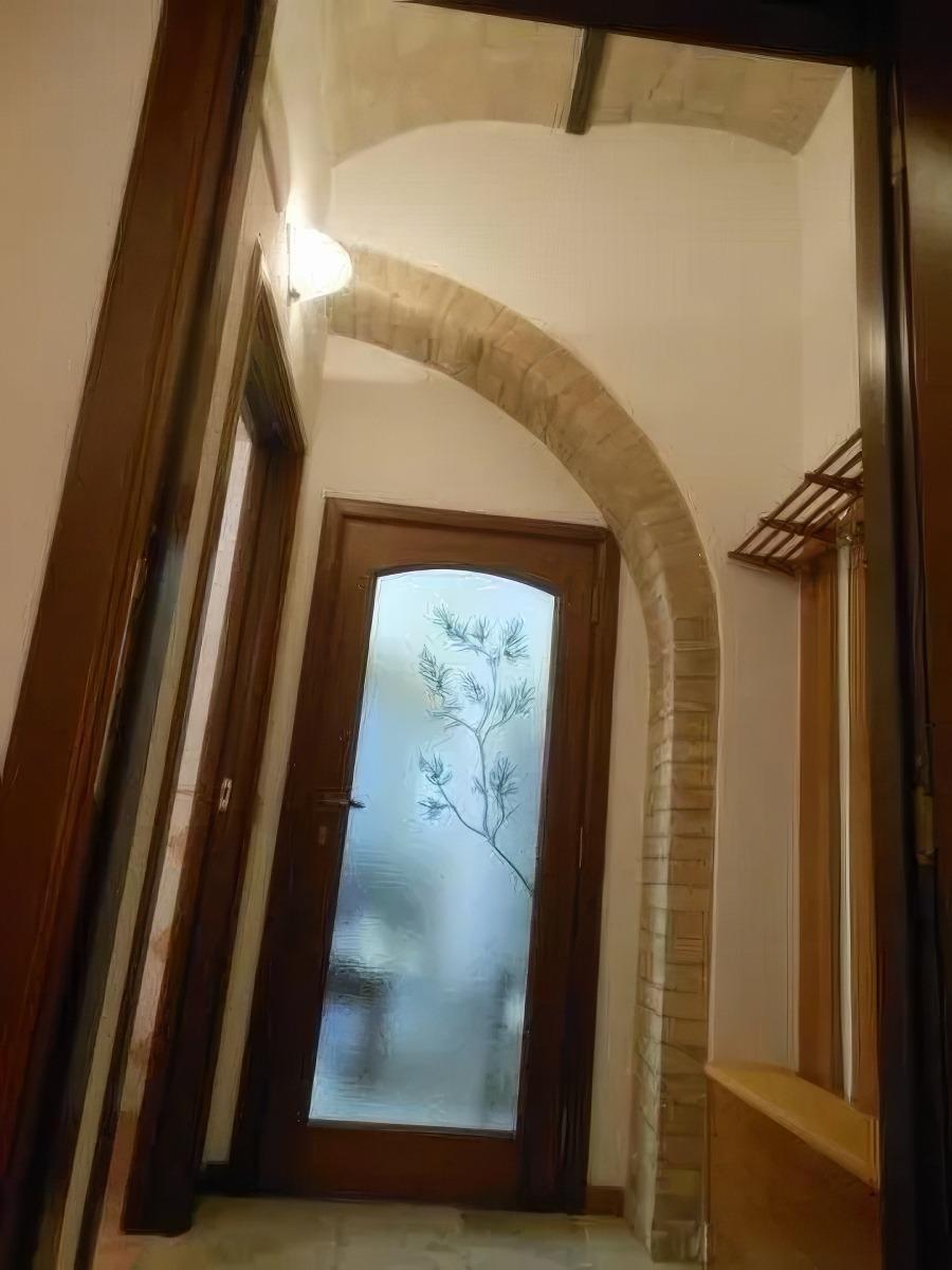 Disimpegno tra camera, bagno e soggiorno