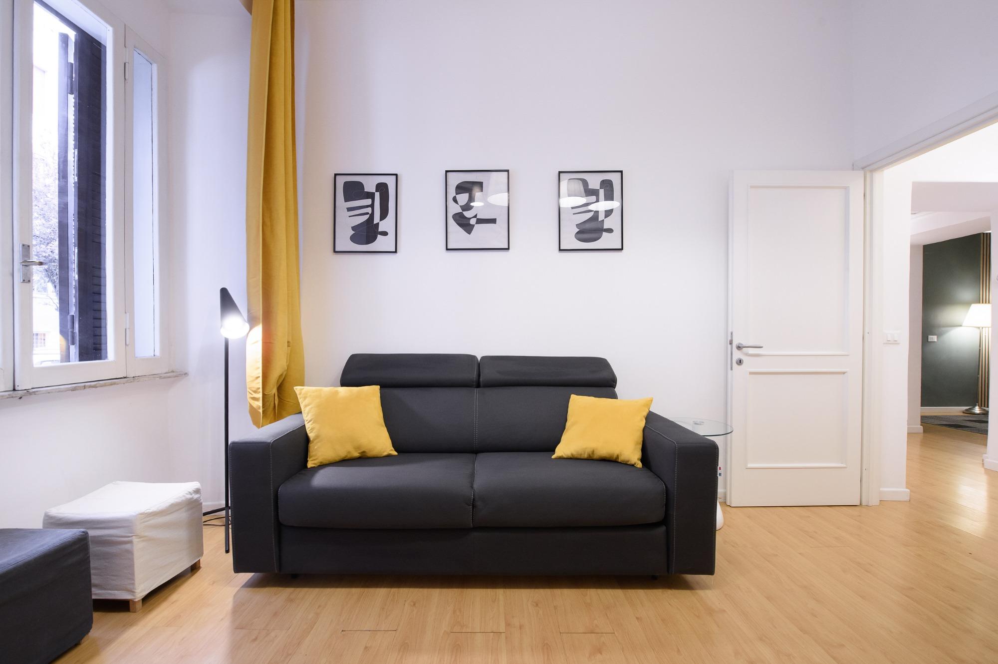 Toto Vatican Suite - Soggiorno con divano letto