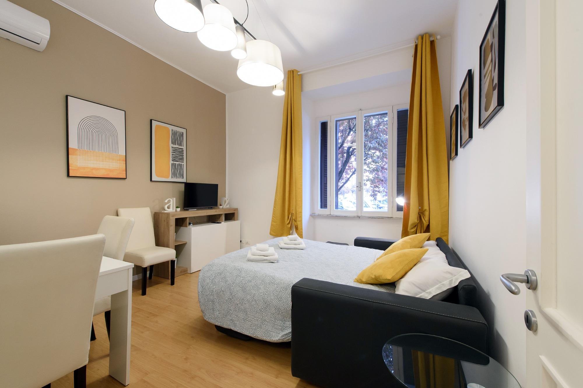 Toto Vatican Suite - Soggiorno con divano letto