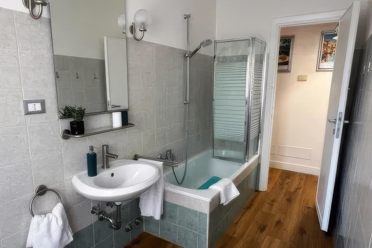 Bathroom with shower and bathtub