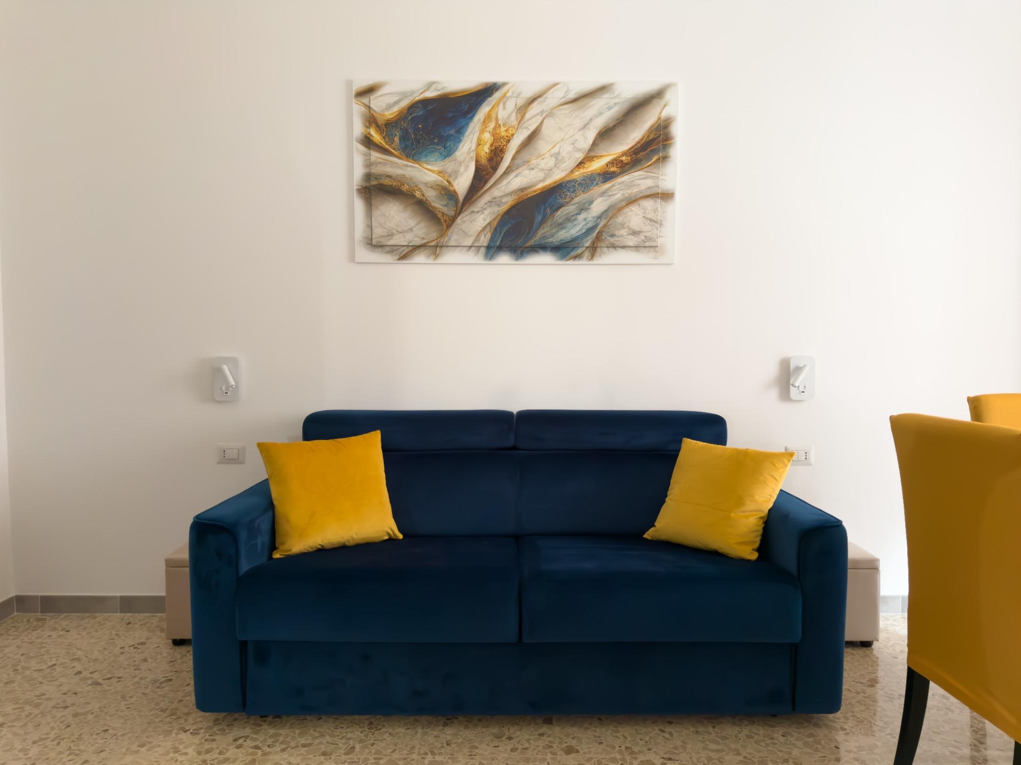 Ampio soggiorno con divano letto matrimoniale