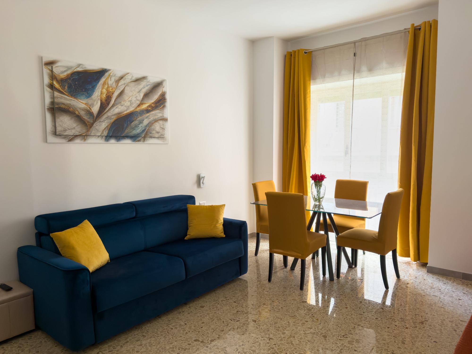 Ampio soggiorno con divano letto matrimoniale