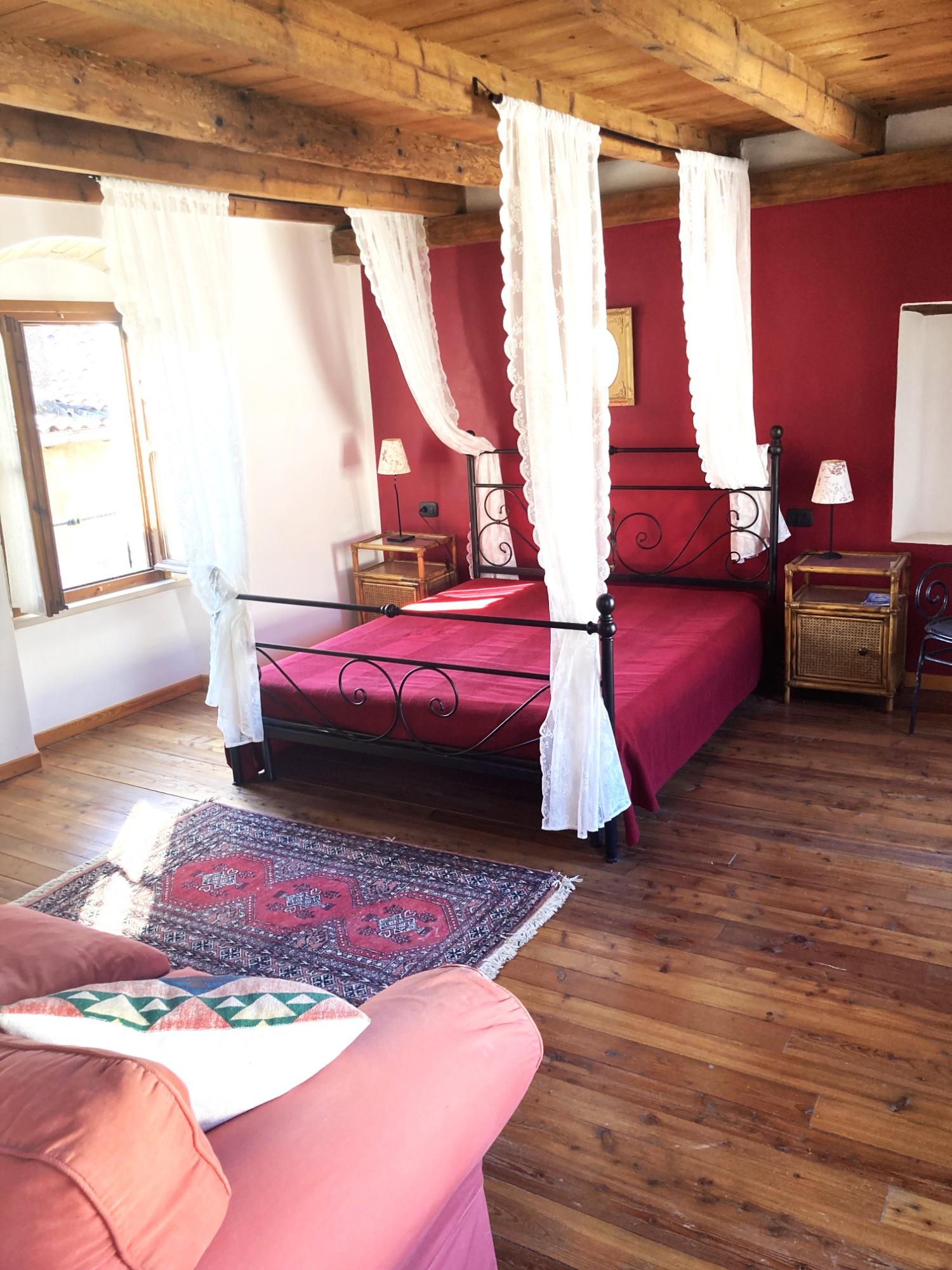 Zona letto appartamento Sirmione del Garda