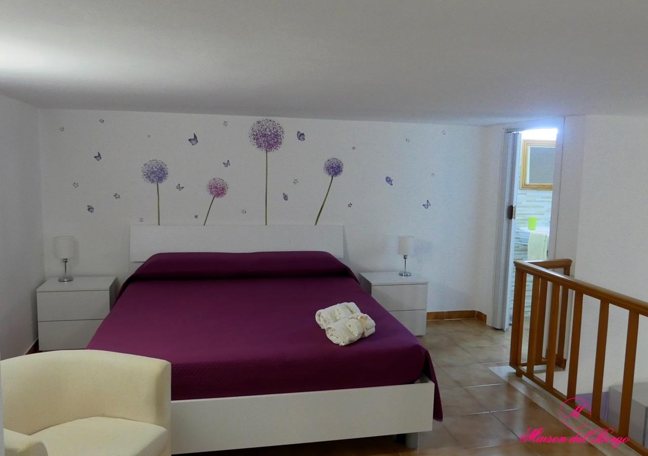 Camera da letto matrimoniale su soppalco