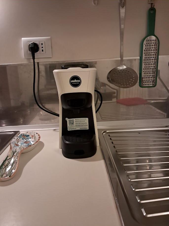 macchina per caffè con cialde offerte dalla casa