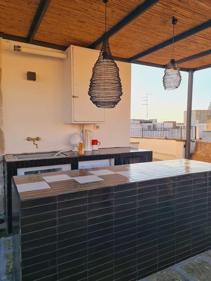 terrazza con bancone bar