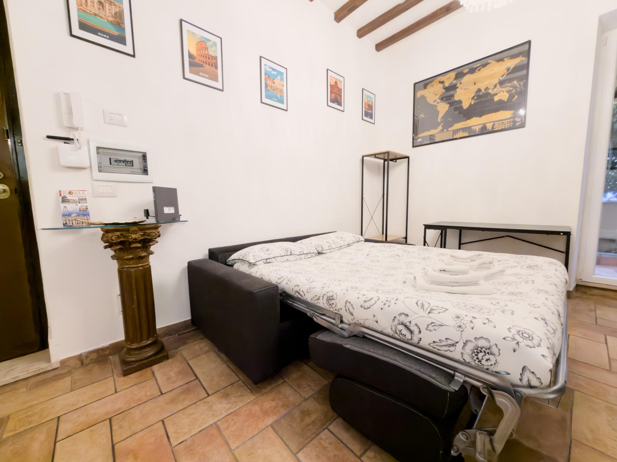 Soggiorno con divano letto matrimoniale