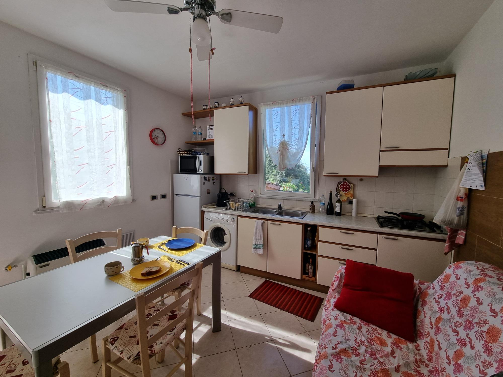 Soggiorno con divano letto matrimoniale