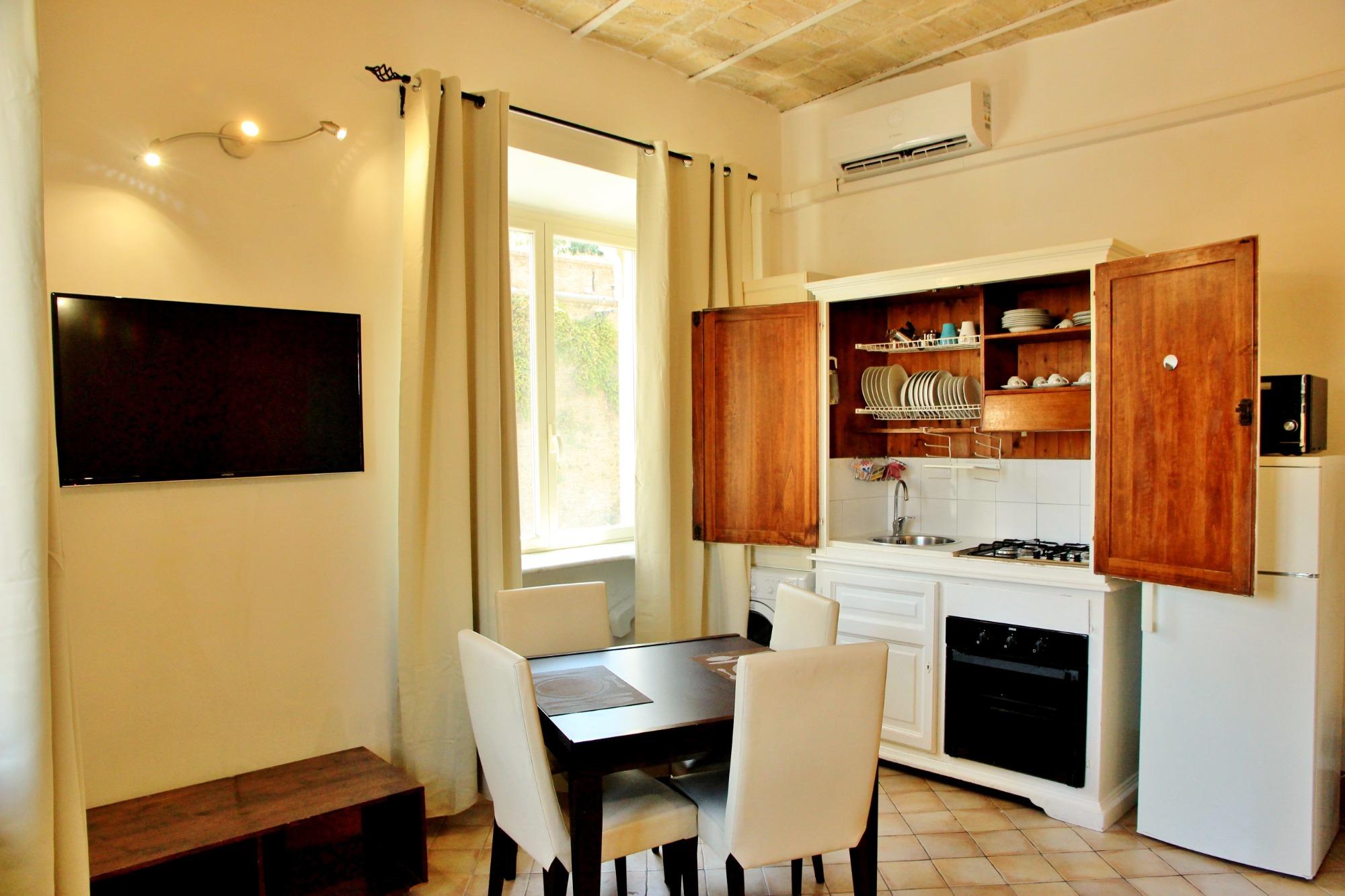 Salone con angolo cottura 1