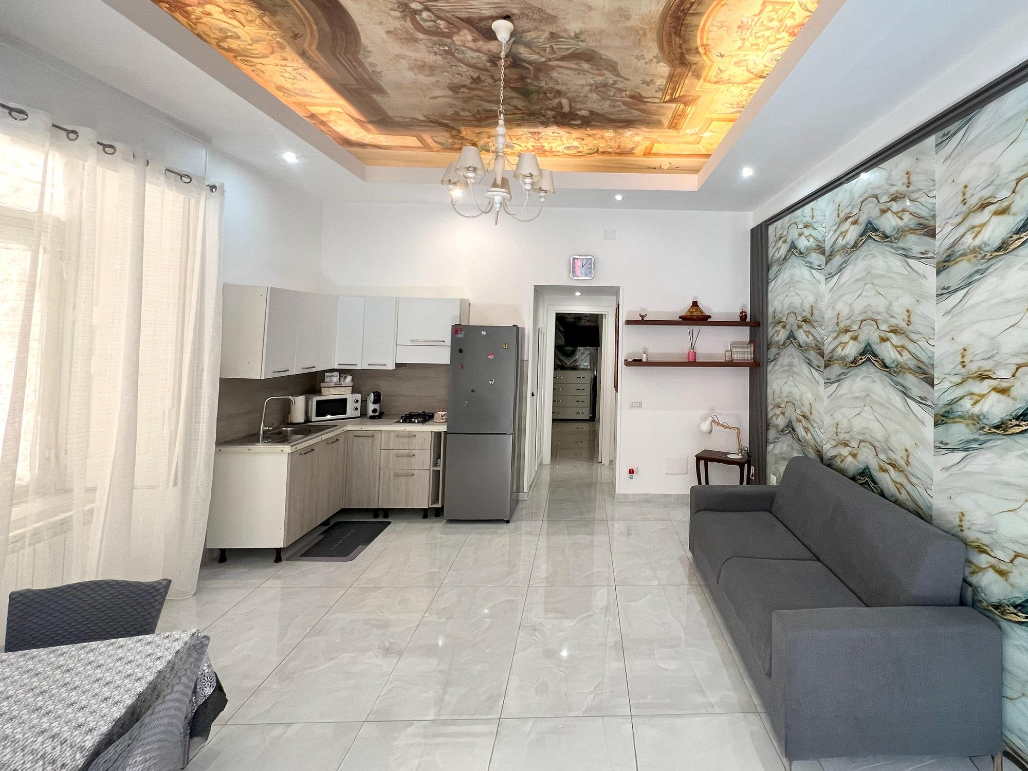 Salone con cucina a vista