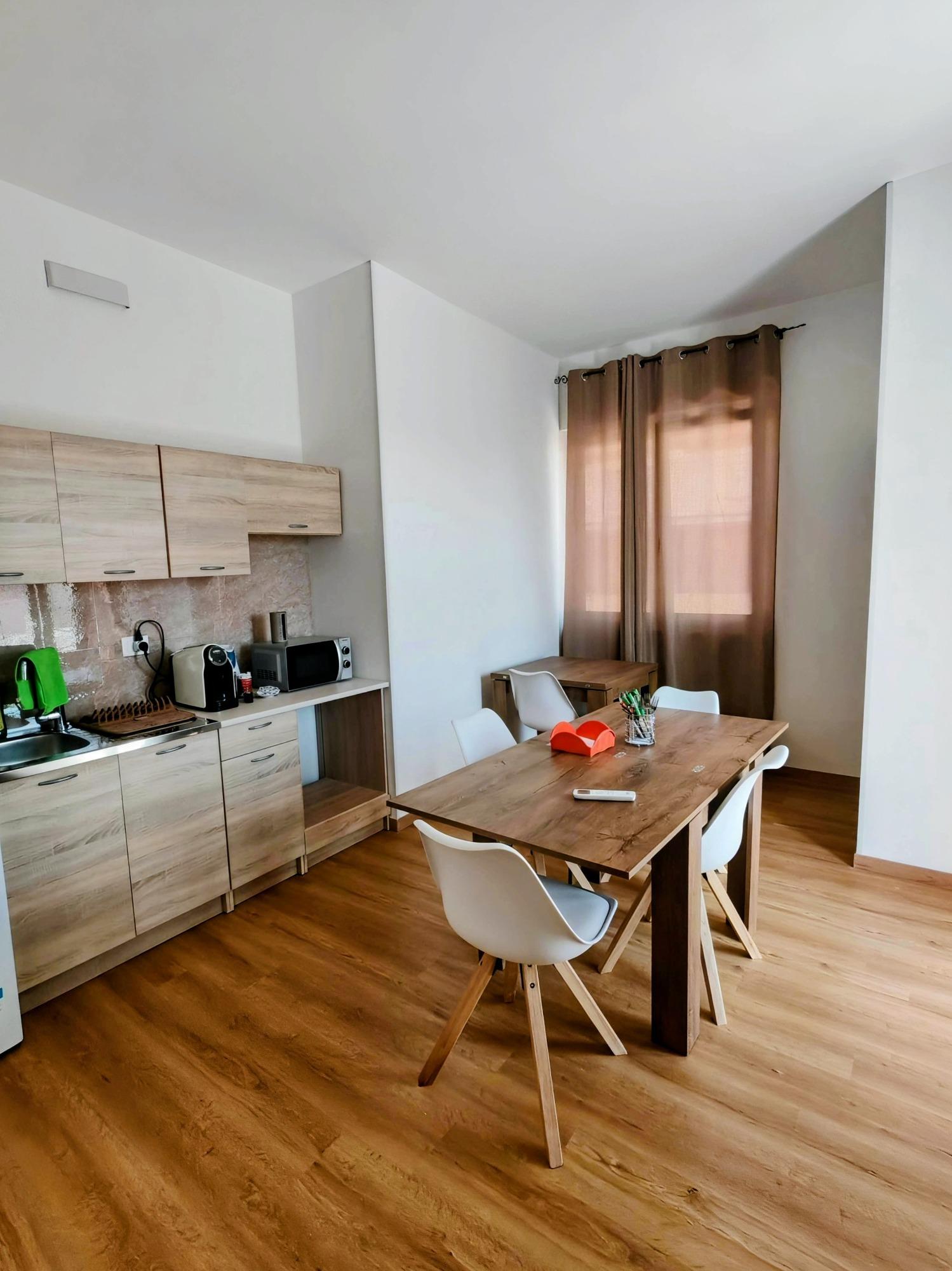 Cucina e sala da pranzo in comune