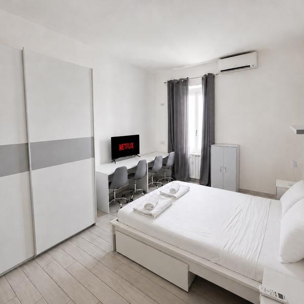 rome termini apartment, in the heart of san lorenzo with private parking
