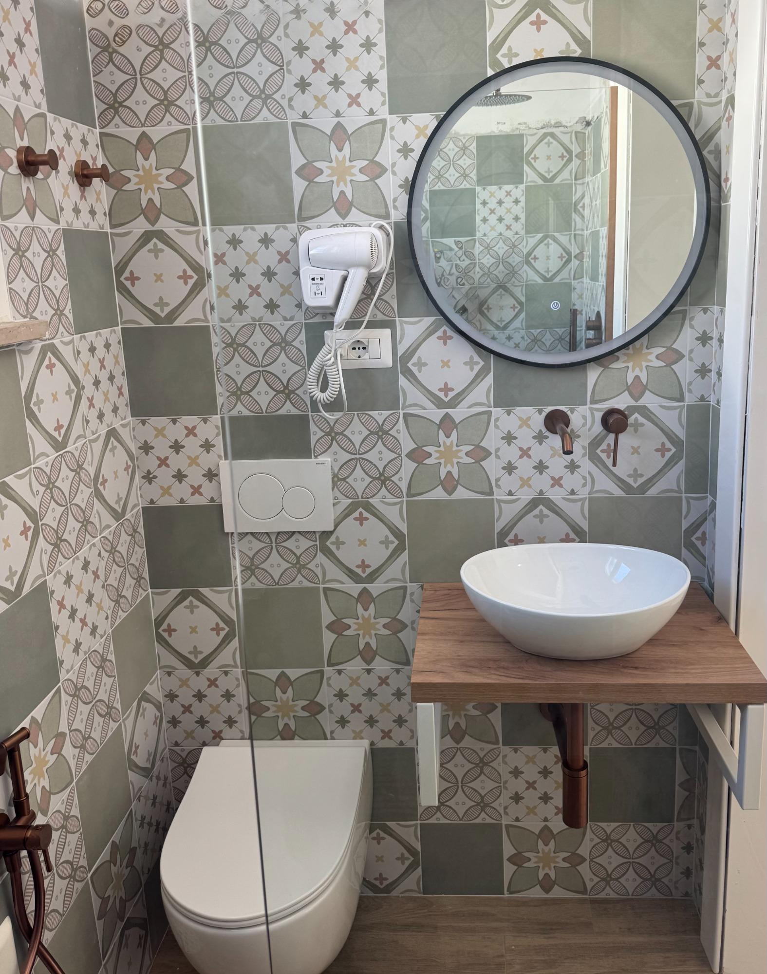 Camera matrimoniale leukòs room