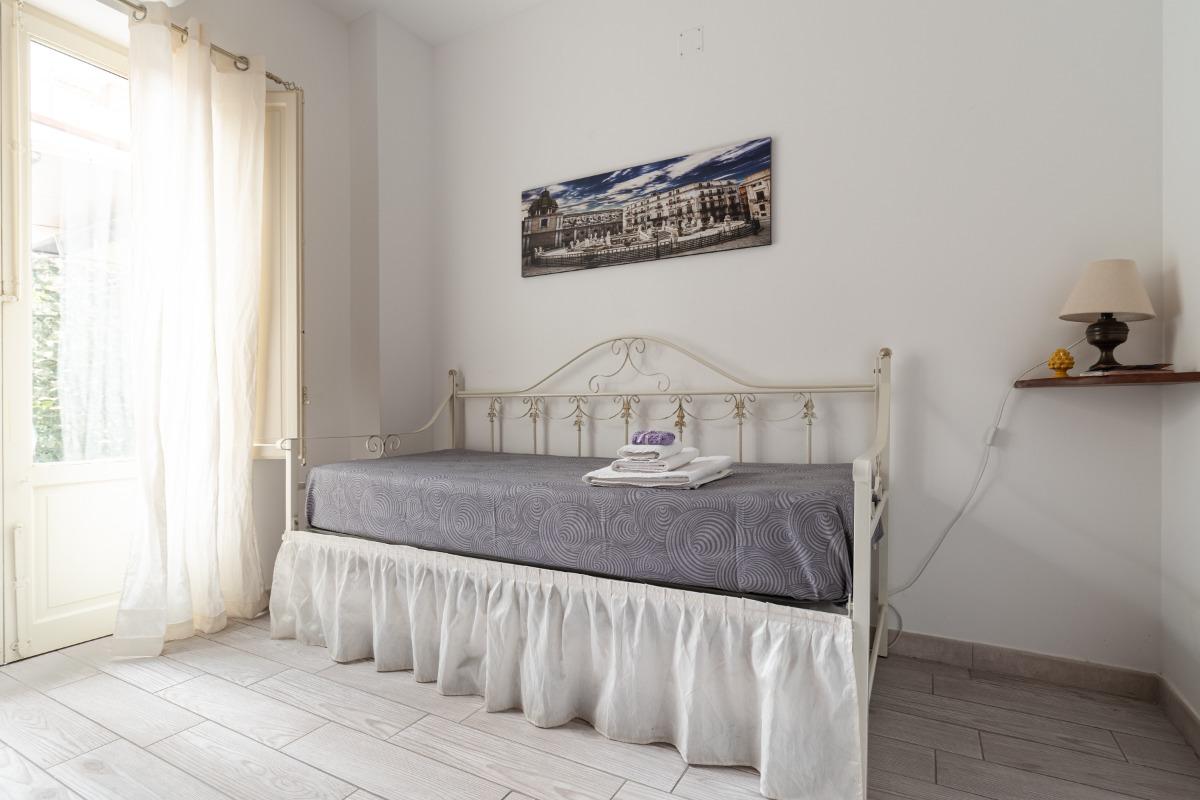 Camera con divano letto