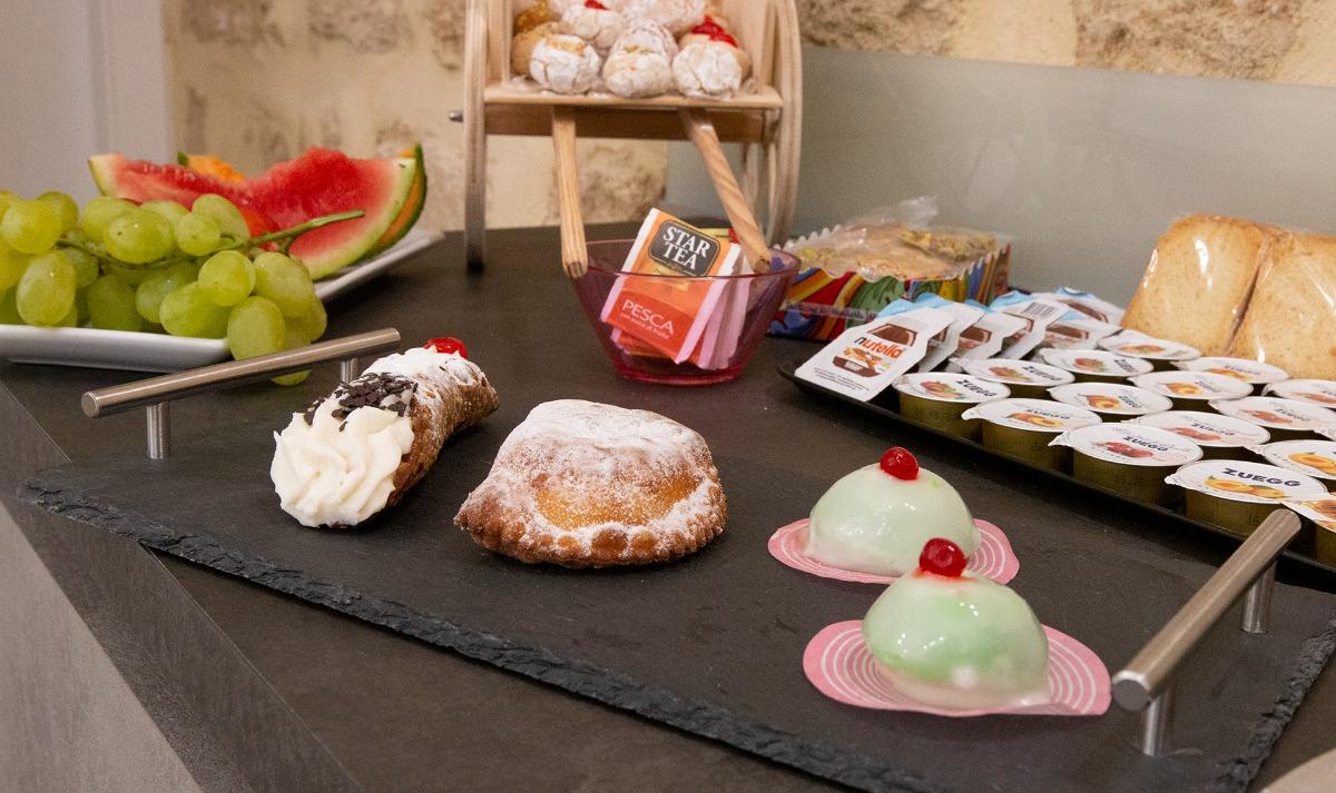 La colazione di DANA ROOMS