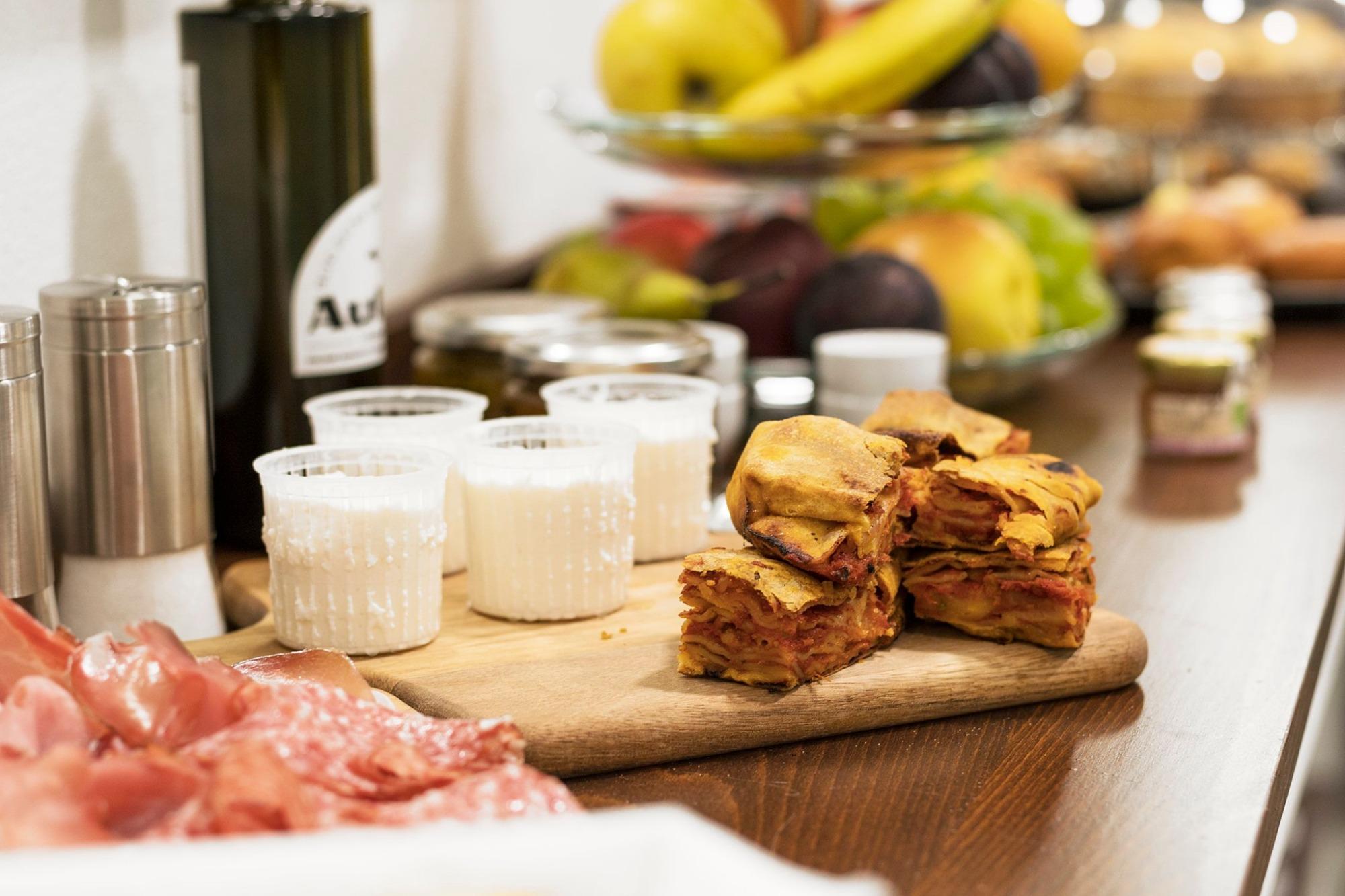 La colazione di CENTOSEDICI ROOMS