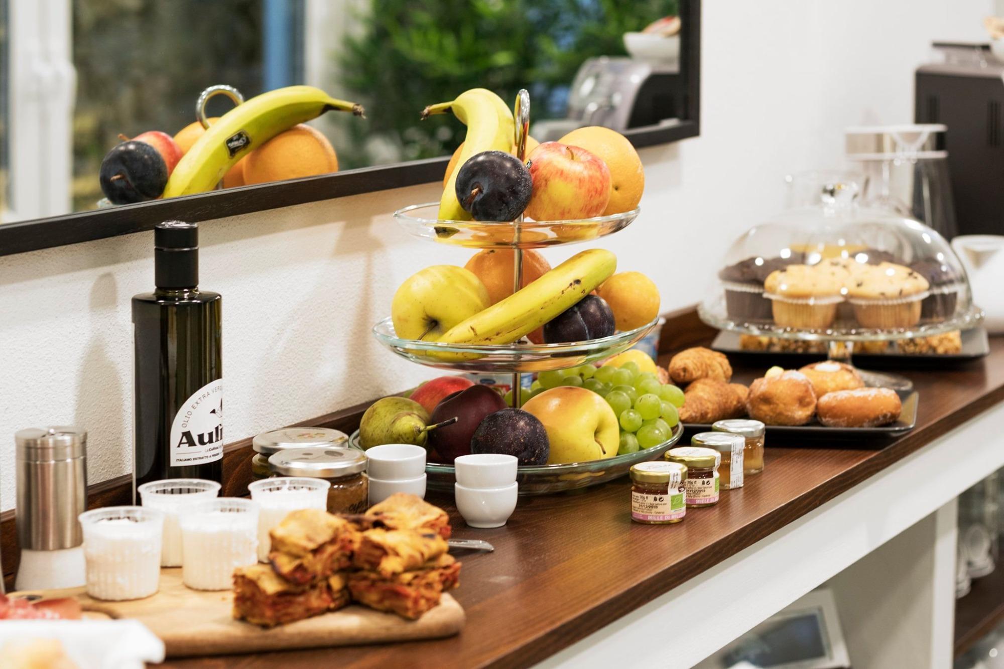 La colazione di CENTOSEDICI ROOMS