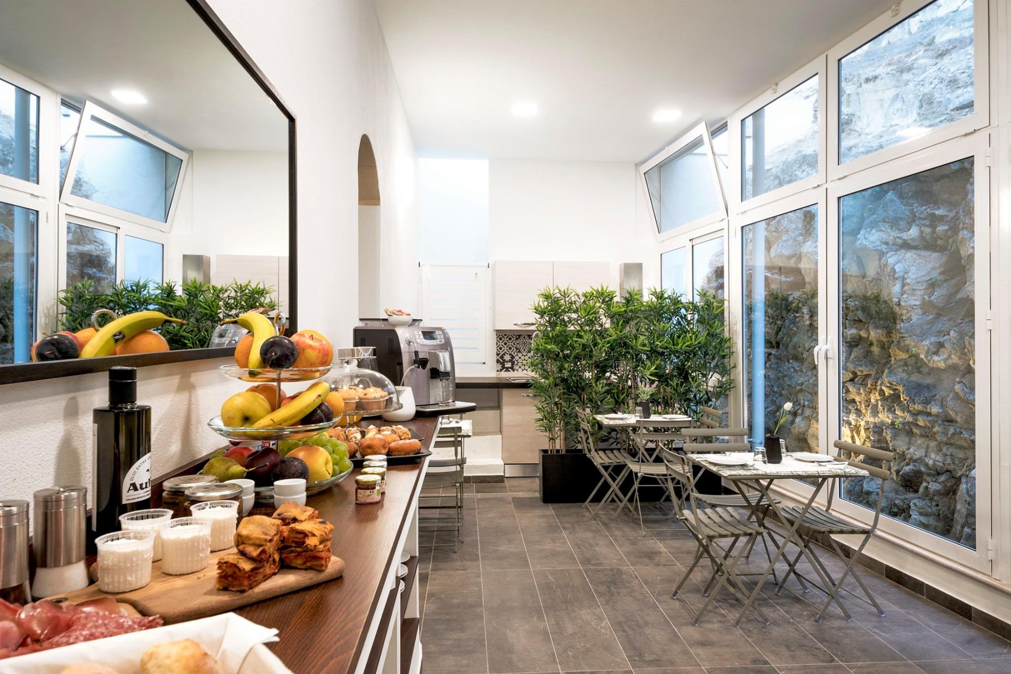 La colazione di CENTOSEDICI ROOMS