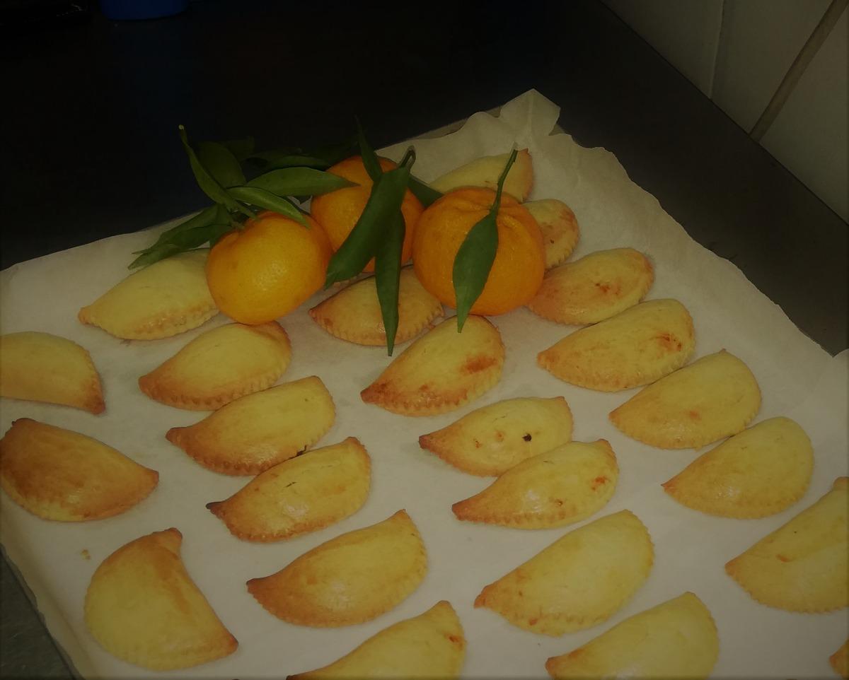 Christas sweets with mandarin and mulled wine