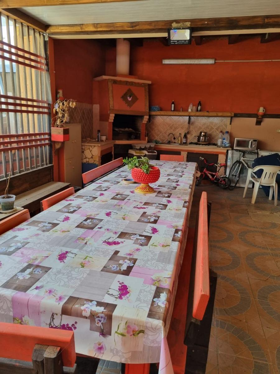 Grande terrazzo della tripla con cucina,barbecue,lavatrive, tavolo 20 posti